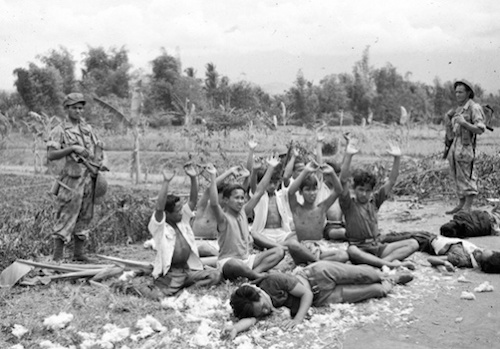 Absence: An image not shown in the Netherlands: soldiers of the Absence: An image not shown in the Netherlands: soldiers of the Royal Dutch East-Indies Army KNIL next to wounded and dead Indonesian soldiers captured in Malang, East Java, in late July 1947.(Unidentified military photographer, DLC, National Archives, The Hague) Indonesian soldiers, in contrast, were portrayed by the magazines as “roaming gangs”.