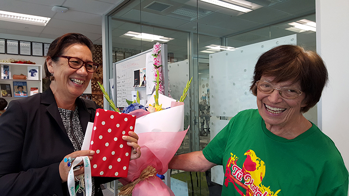 Outgoing chair Isabella Rasch with her flowers from Tui O'Sullivan and the PMC board. Image: Del Abcede/PMC