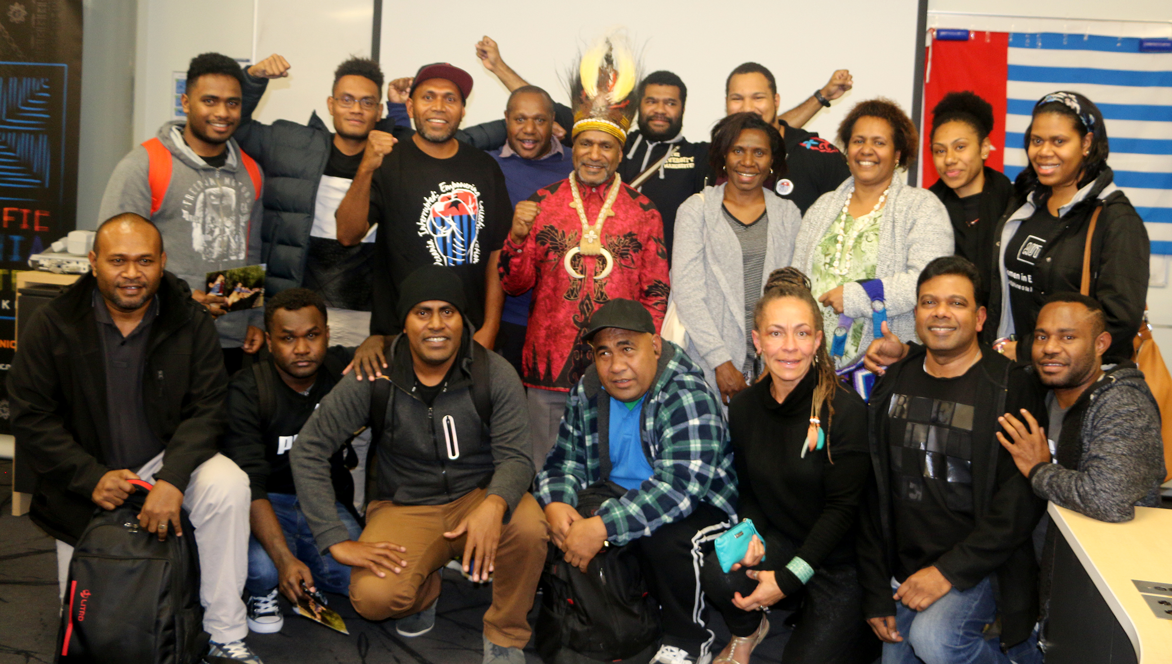 Benny Wendy with wantok students…representing a “united” Pacific for West Papua. Image: Del Abcede/PMC