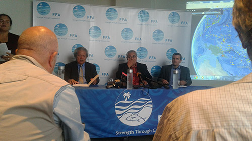 FFA Director-General James Movick (centre) and M-RAG Asia Pacific’s Duncan Souter, together with Forum Fisheries Committee chairman Pita Elisala address media. Image: Kendall Hutt/Asia Pacific Journalism