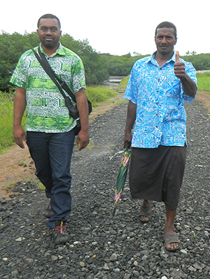 The Headman of the Daku village, Biu Naitasi, with Tuverea who is working with USAID/C-CAP. Image: Ami Dhabuwala/PMC