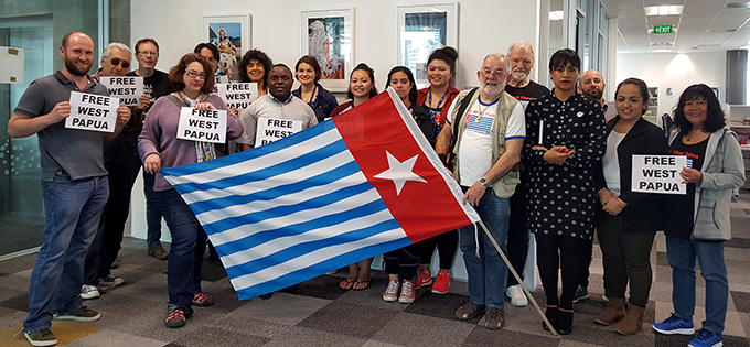 Supporters of a "Free West Papua" at the flag-raising ceremony today. Image: Luqman Hayes/AUT