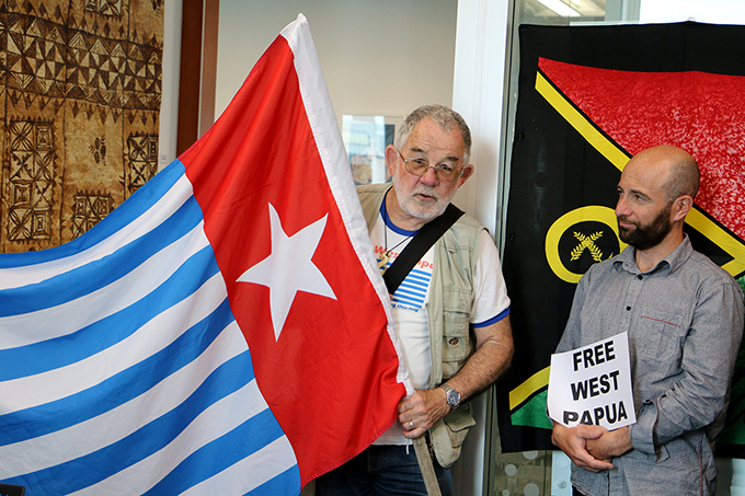 Kevin McBride of Pax Christi and Luqman Hayes of AUT Library's digital journal Tuwhera project at the West Papua flag-raising today. Image: Del Abcede/PMC