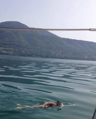 British swimmers cross Lake Geneva with West Papua petition