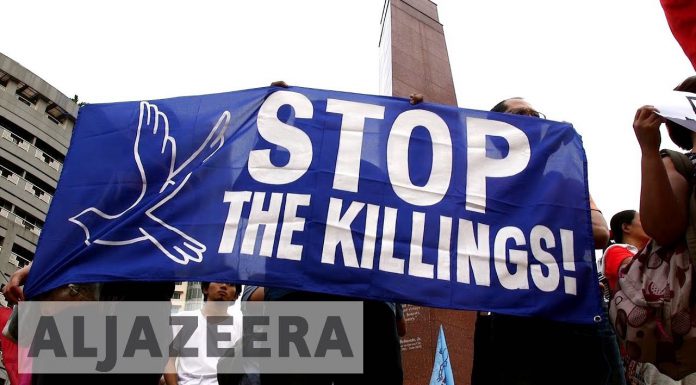 Thousands of Filipinos demand end to killings in Duterte’s drug war