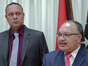 Communications Minister Sam Basil with Prime Minister Peter O’Neill – worried about the wellbeing of PNG or just politicians feelings being hurt? Image: PNG Attitude