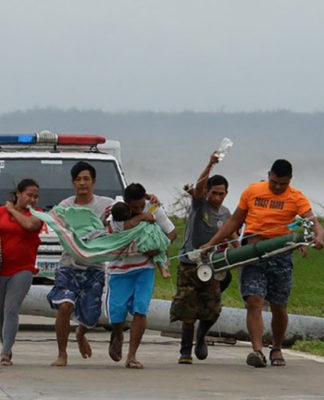 Typhoon Mangkhut devastates north of Philippines with at least 64 dead