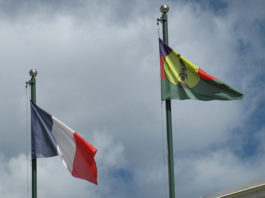 Two flags ... French tricolour and the Kanak ensign