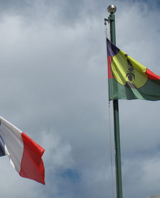 Two flags ... French tricolour and the Kanak ensign
