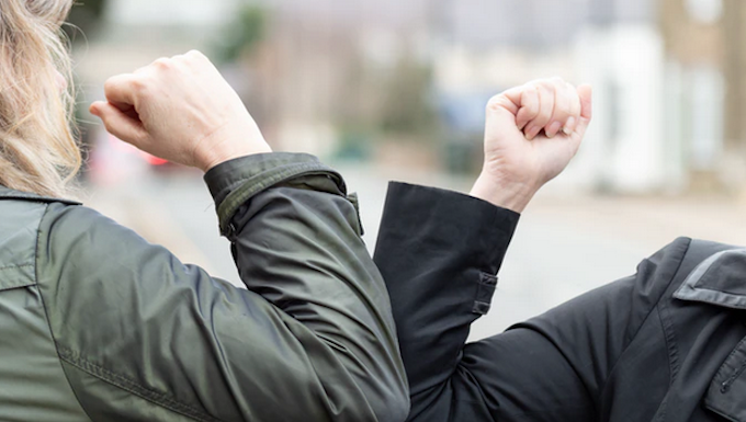 Why New Zealand needs to continue decisive action to contain coronavirus Elbow bump