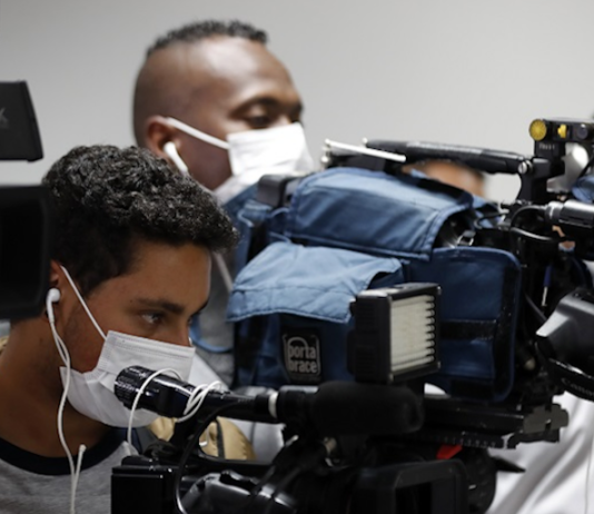 Journalists with facemasks