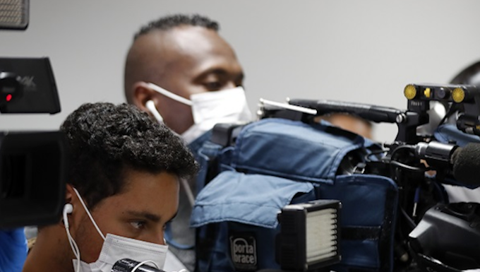 Journalists with facemasks