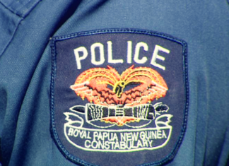 PNG police badge