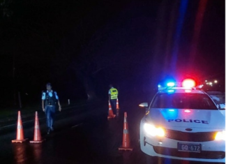 Fiji police curfew roadblock