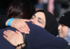 A supporter hug at Christchurch sentencing