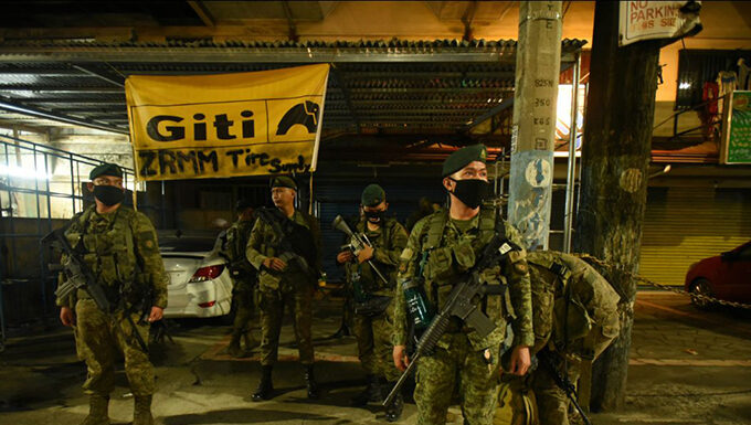 Philippine checkpoint soldiers shoot and kill investigative journalist Philippine military