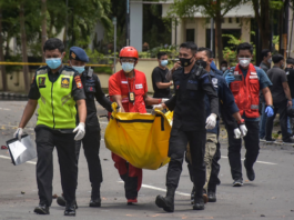 Indonesian police carry remains
