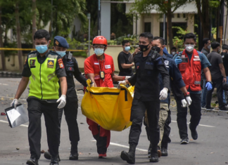 Indonesian police carry remains