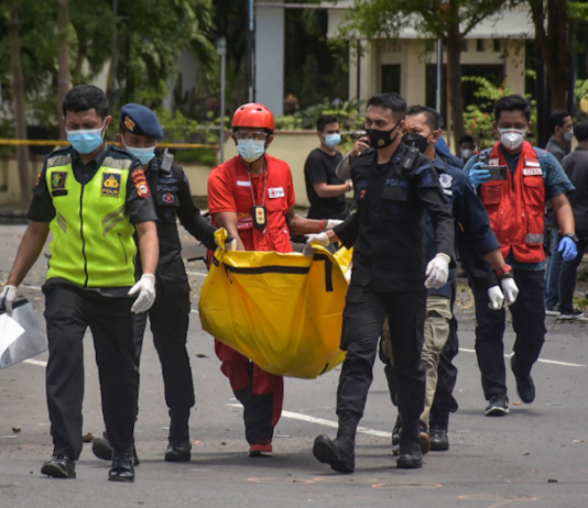 Indonesian police carry remains
