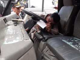 Smashed police truck window