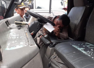 Smashed police truck window