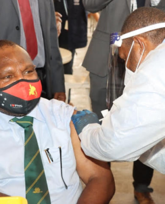 PNG Prime Minister James Marape being vaccinated