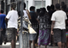Fijians line up to access their F$90 government assistance