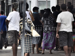 Fijians line up to access their F$90 government assistance