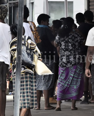 Fijians line up to access their F$90 government assistance