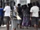 Fijians line up to access their F$90 government assistance