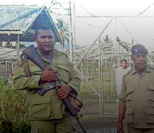 Armed guards at Giligili jail