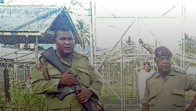 Armed guards at Giligili jail
