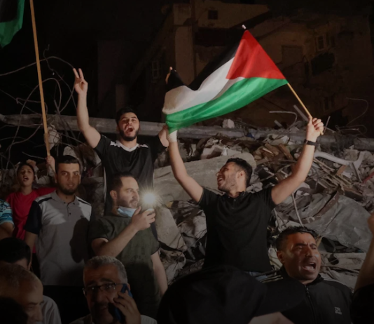 Palestians celebrate the Gaza truce. 200521