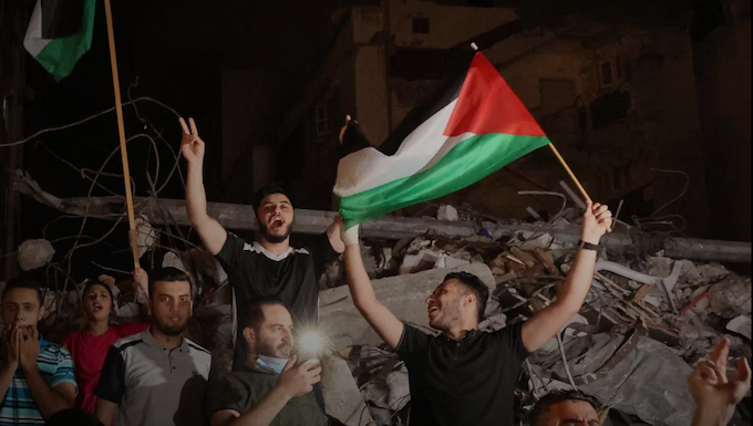 Palestians celebrate the Gaza truce. 200521