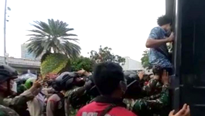May Day Papuan students being arrested