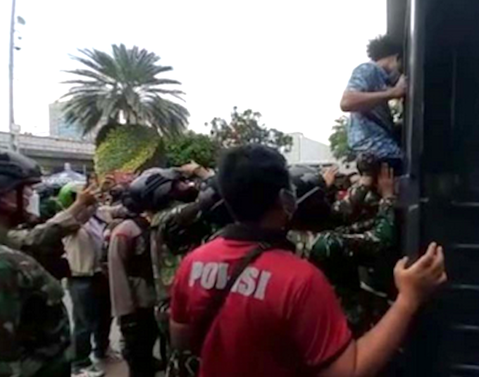 May Day Papuan students being arrested