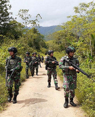 Indonesian soldiers on patrol in West Papua