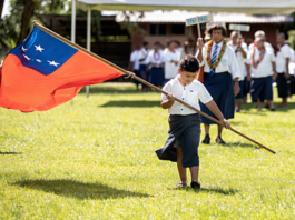 Samoan flag and child