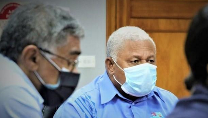 Fiji suffers 5 more deaths, 404 new cases in covid crisis Fiji's Health Secretary Dr James Fong (left) and Prime Minister Voreqe Bainimarama