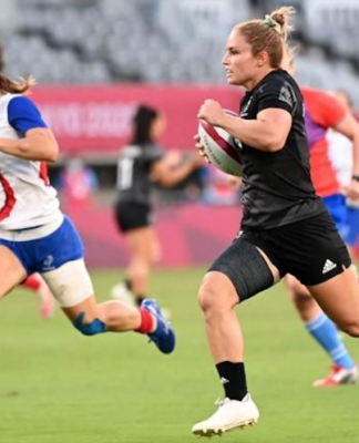 Sevens Black Fern Michaela Blyde with France's Camille Grassineau in Tokyo