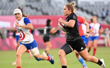 Sevens Black Fern Michaela Blyde with France's Camille Grassineau in Tokyo