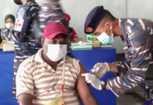 A Papuan man being vaccinated at Sorong, West Papua