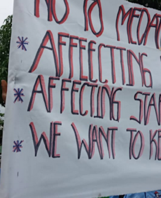 Lae workers protest against covid jab