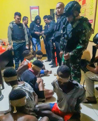 Papuans arrested and blindfolded in an Indonesian military crackdown in Maybrat Sept 2021