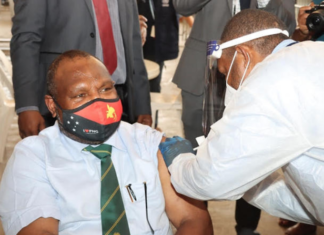 PNG Prime Minister James Marape being vaccinated