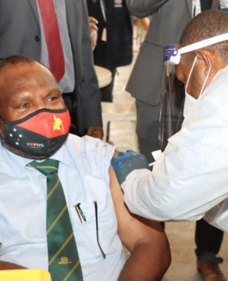 PNG Prime Minister James Marape being vaccinated