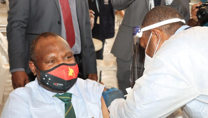 PNG Prime Minister James Marape being vaccinated