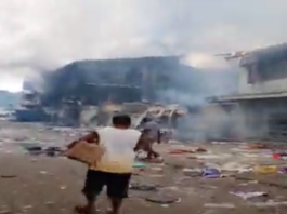 The aftermath of rioting in Chinatown yesterday.