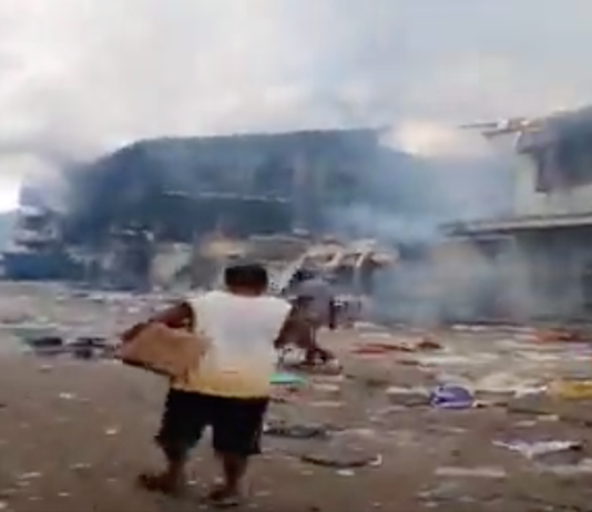 The aftermath of rioting in Chinatown yesterday.