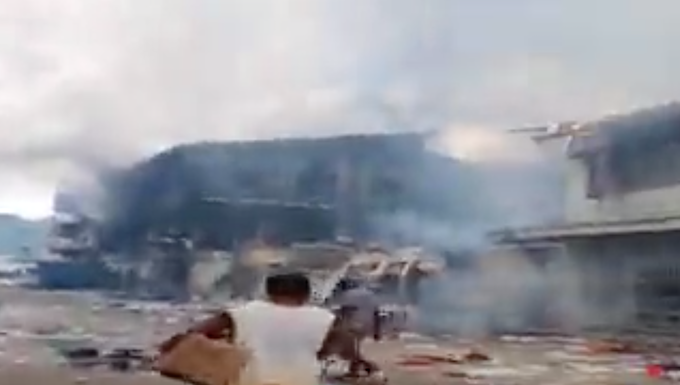 The aftermath of rioting in Chinatown yesterday.
